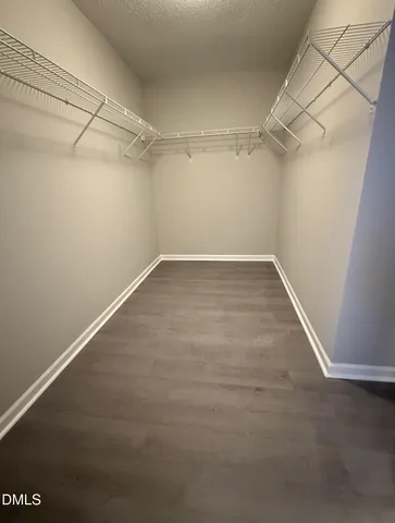 a view of a room with racks on the wall