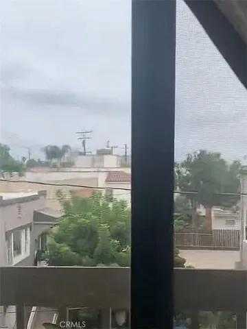 a view of a lake from a balcony