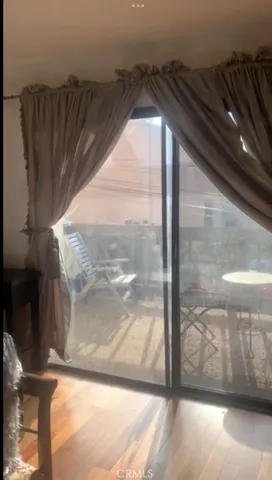 a view of a glass door of the house