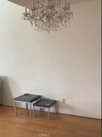 a view of a room with table and chair