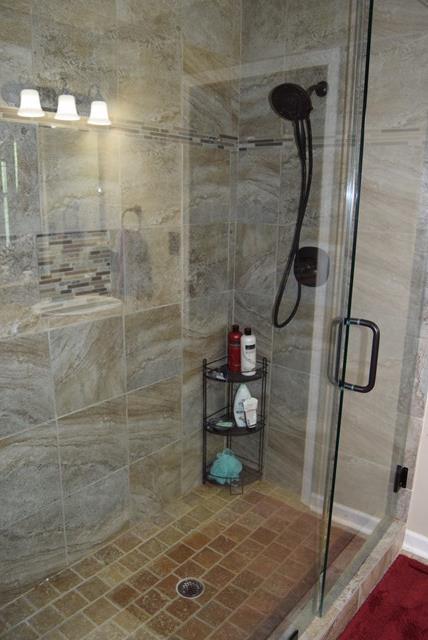 9198 Hopewell Road Lizella, GA 31052 - Photo 22 of 31 a bathroom with a shower