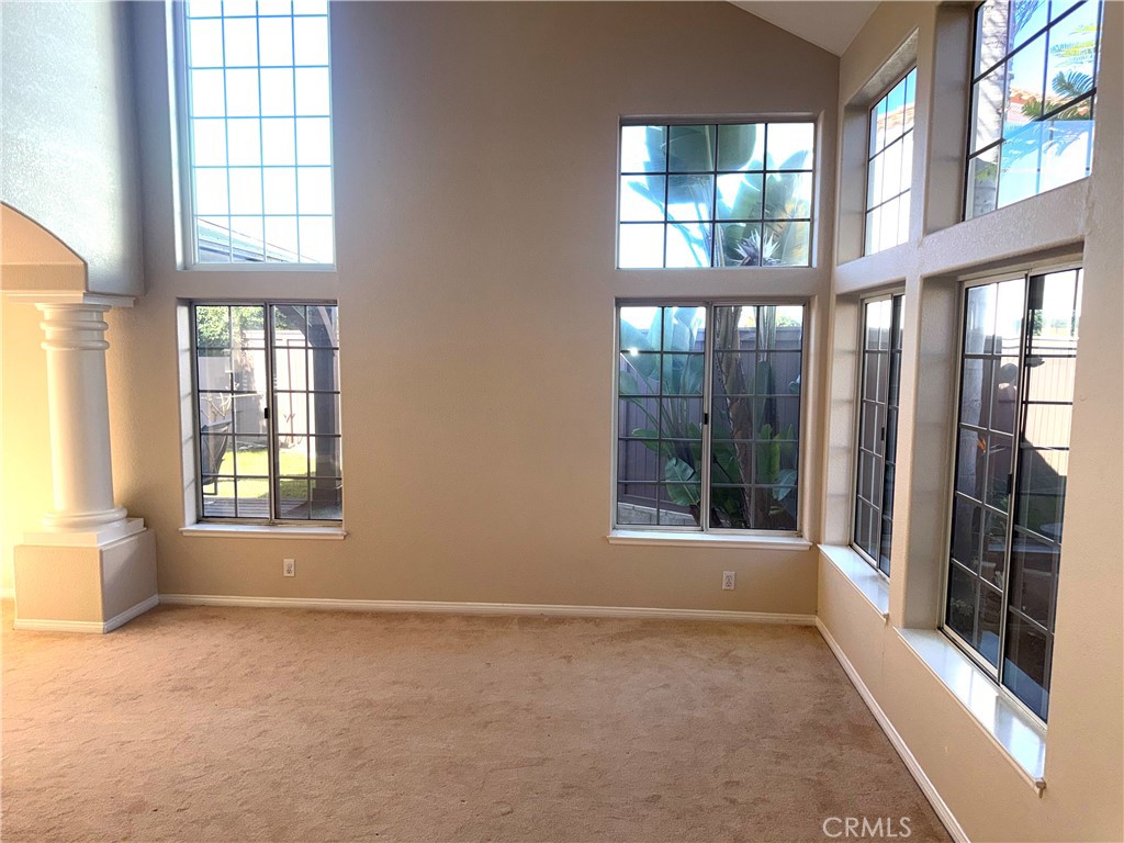 1053 Regatta Costa Mesa, CA 92627 - Photo 4 of 24 a view of an empty room with a window