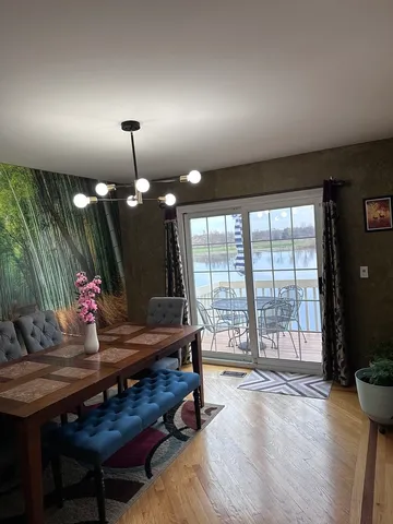 a bedroom with a bed and a furniture