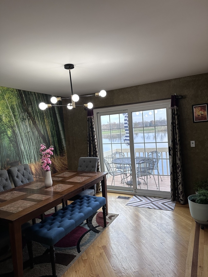 2153 Seaver Lane Hoffman Estates, IL 60169 - Photo 16 of 36 a living room with furniture and a large window