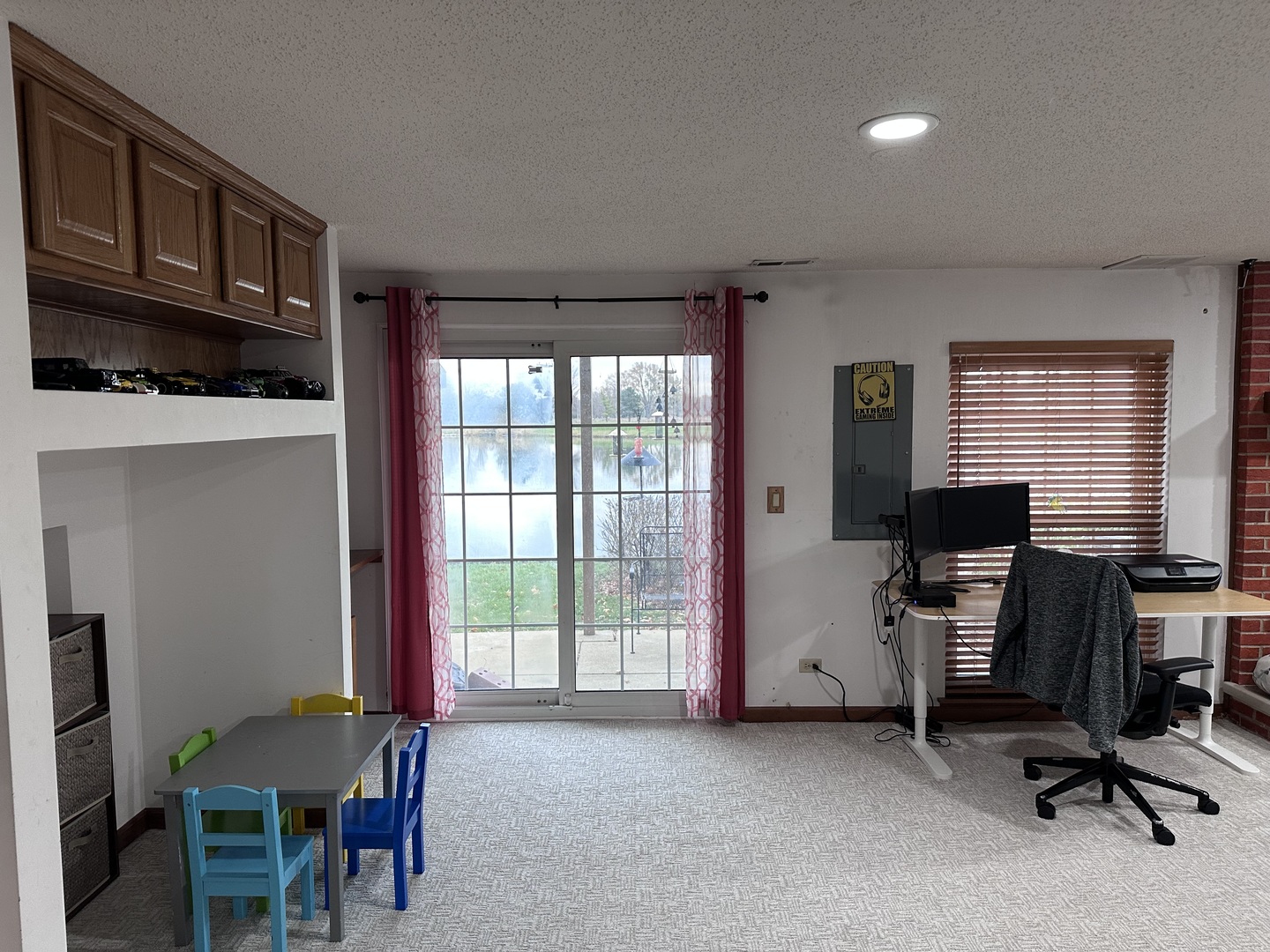 2153 Seaver Lane Hoffman Estates, IL 60169 - Photo 30 of 36 a view of a workspace with furniture and a window