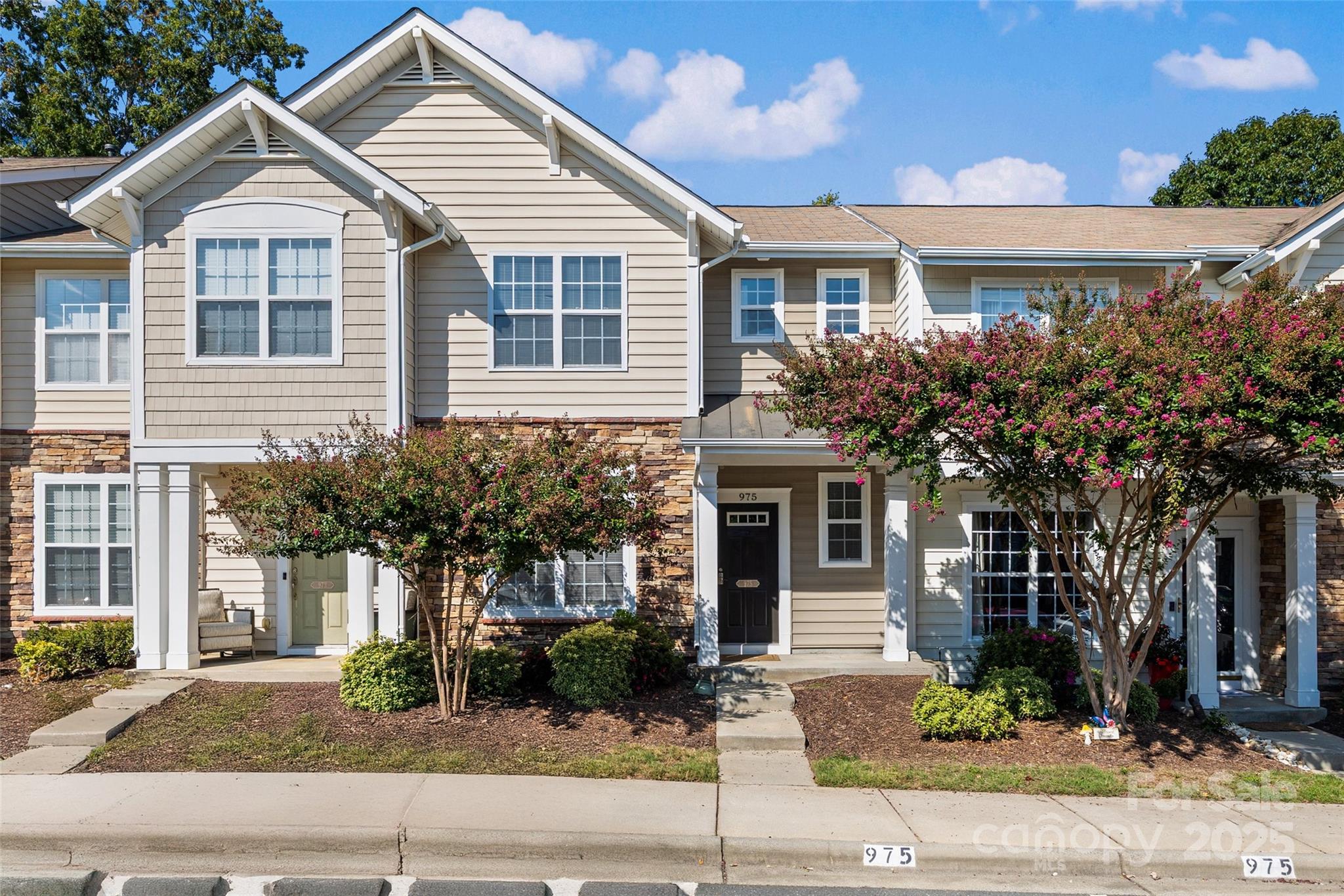 975 Copperstone Lane Fort Mill, SC 29708 - Photo 1 of 35 a front view of a house with garage and plants