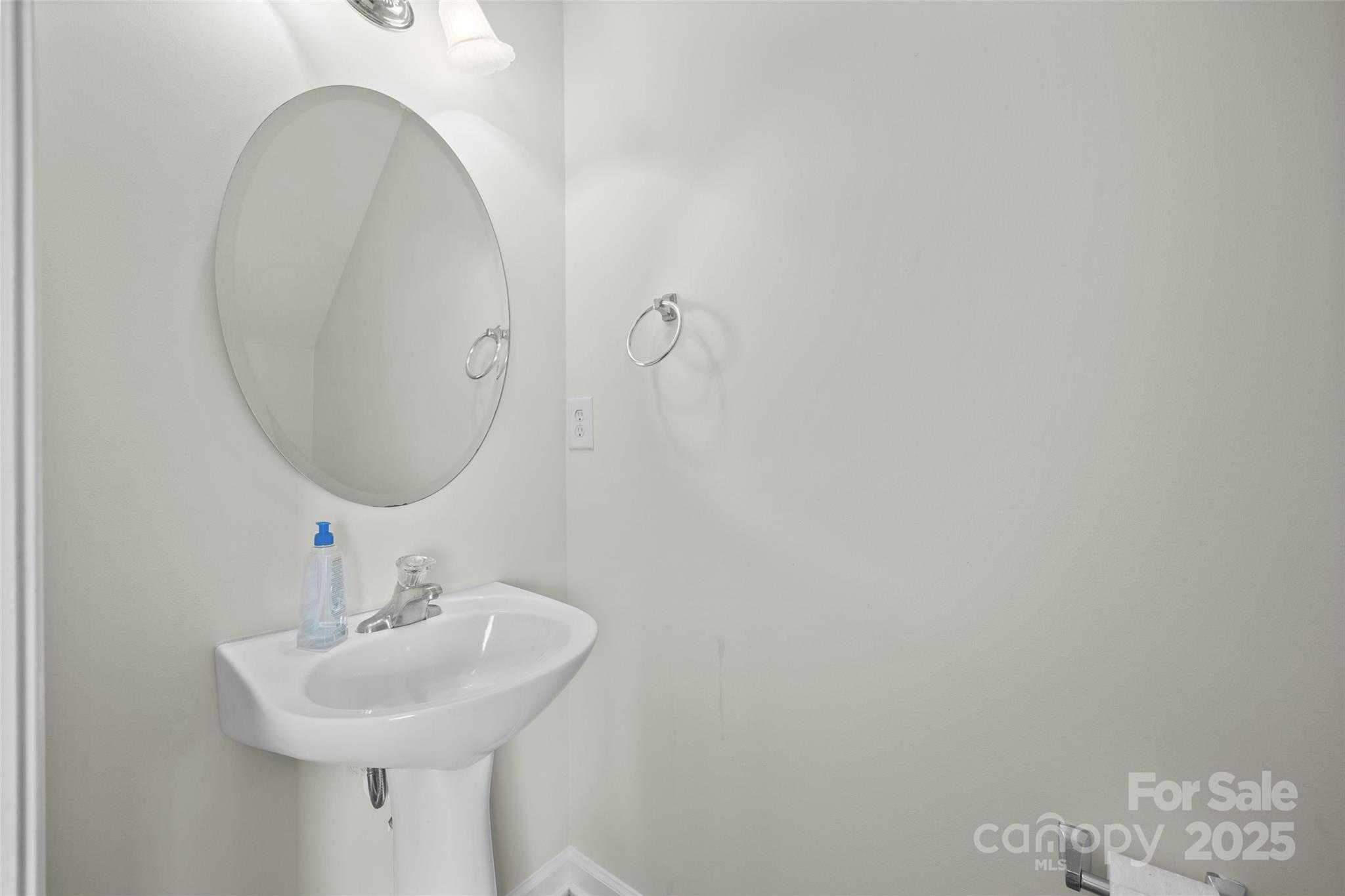 975 Copperstone Lane Fort Mill, SC 29708 - Photo 16 of 35 a bathroom with a sink and a mirror