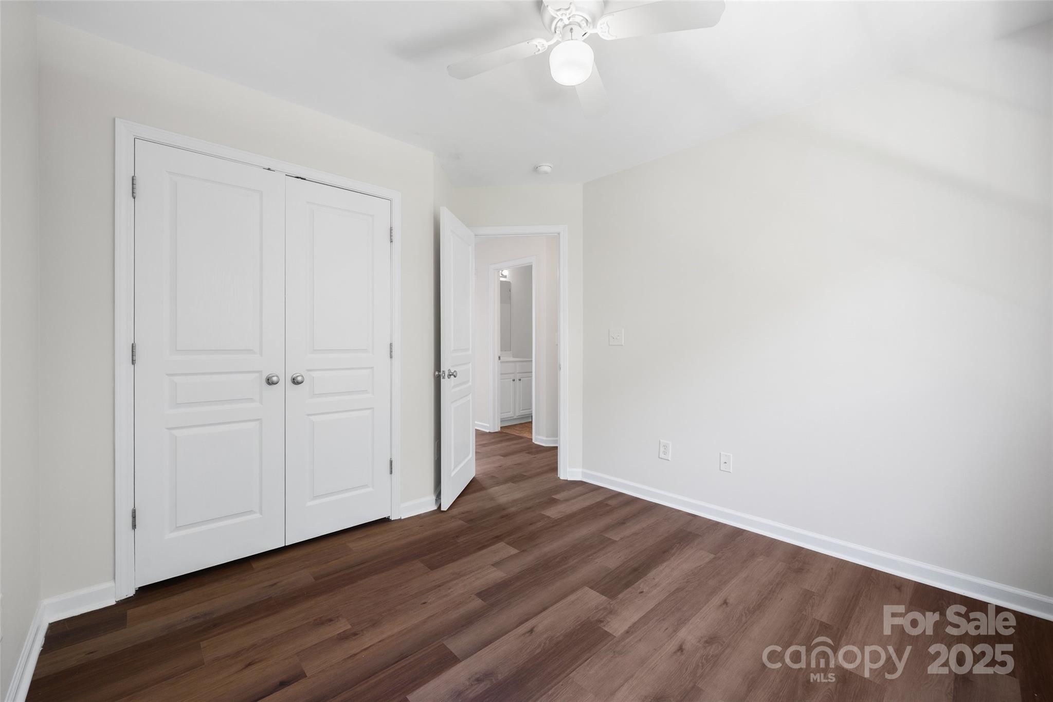 975 Copperstone Lane Fort Mill, SC 29708 - Photo 18 of 35 a view of an empty room with wooden floor