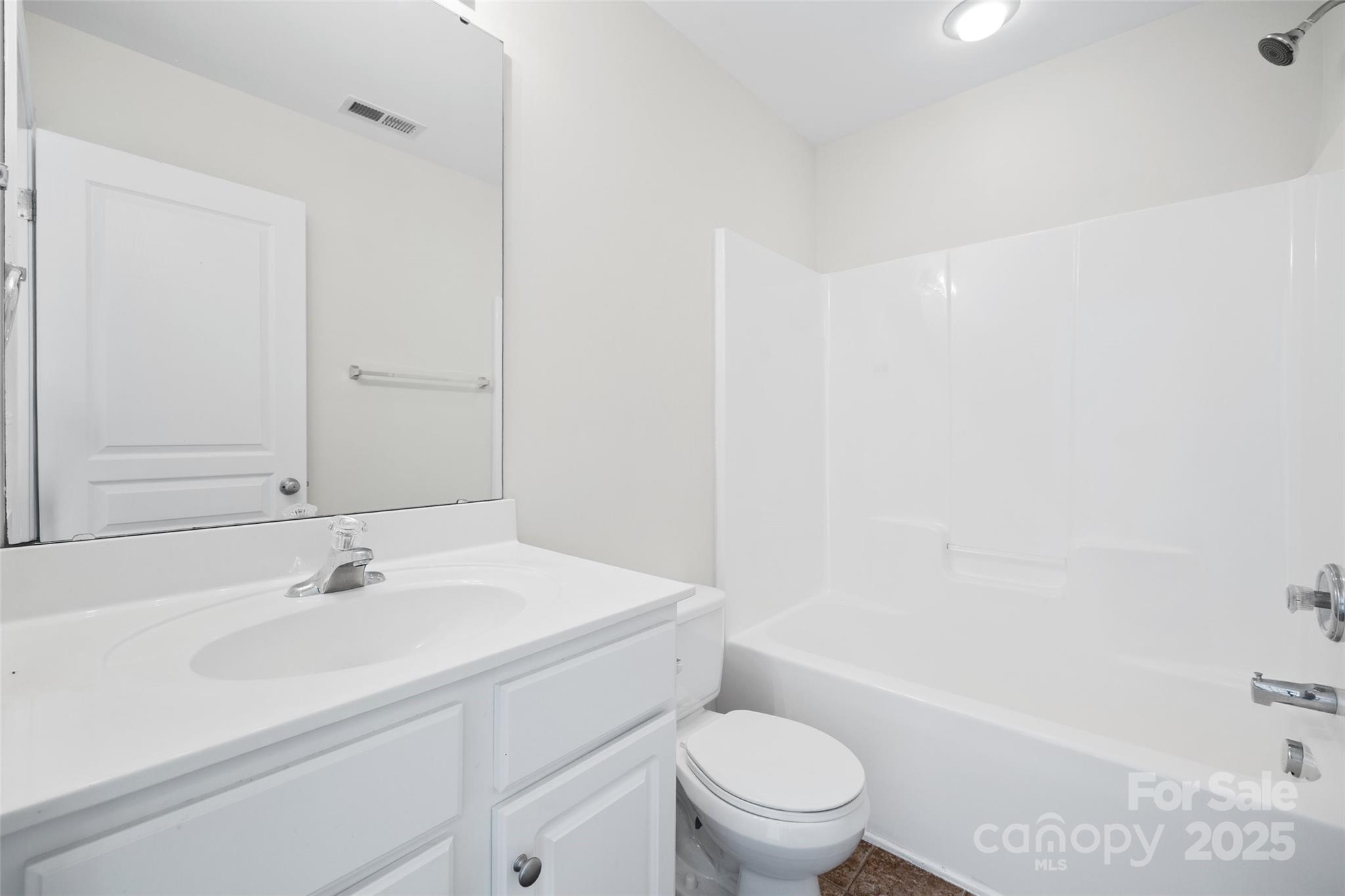 975 Copperstone Lane Fort Mill, SC 29708 - Photo 21 of 35 a bathroom with a sink toilet and vanity