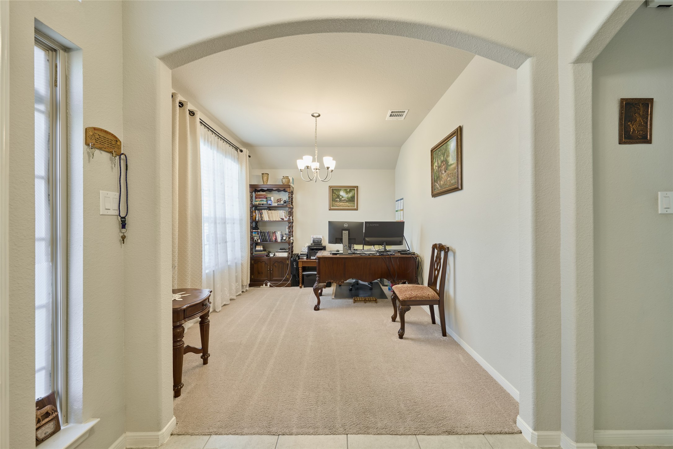 2020 Cedar Tree Court Conroe, TX 77301 - Photo 8 of 26 this is a multi-purpose room. Currently used as a home office, it can serve as a formal dining room, a kids playroom or make it a 4th bedroom.
