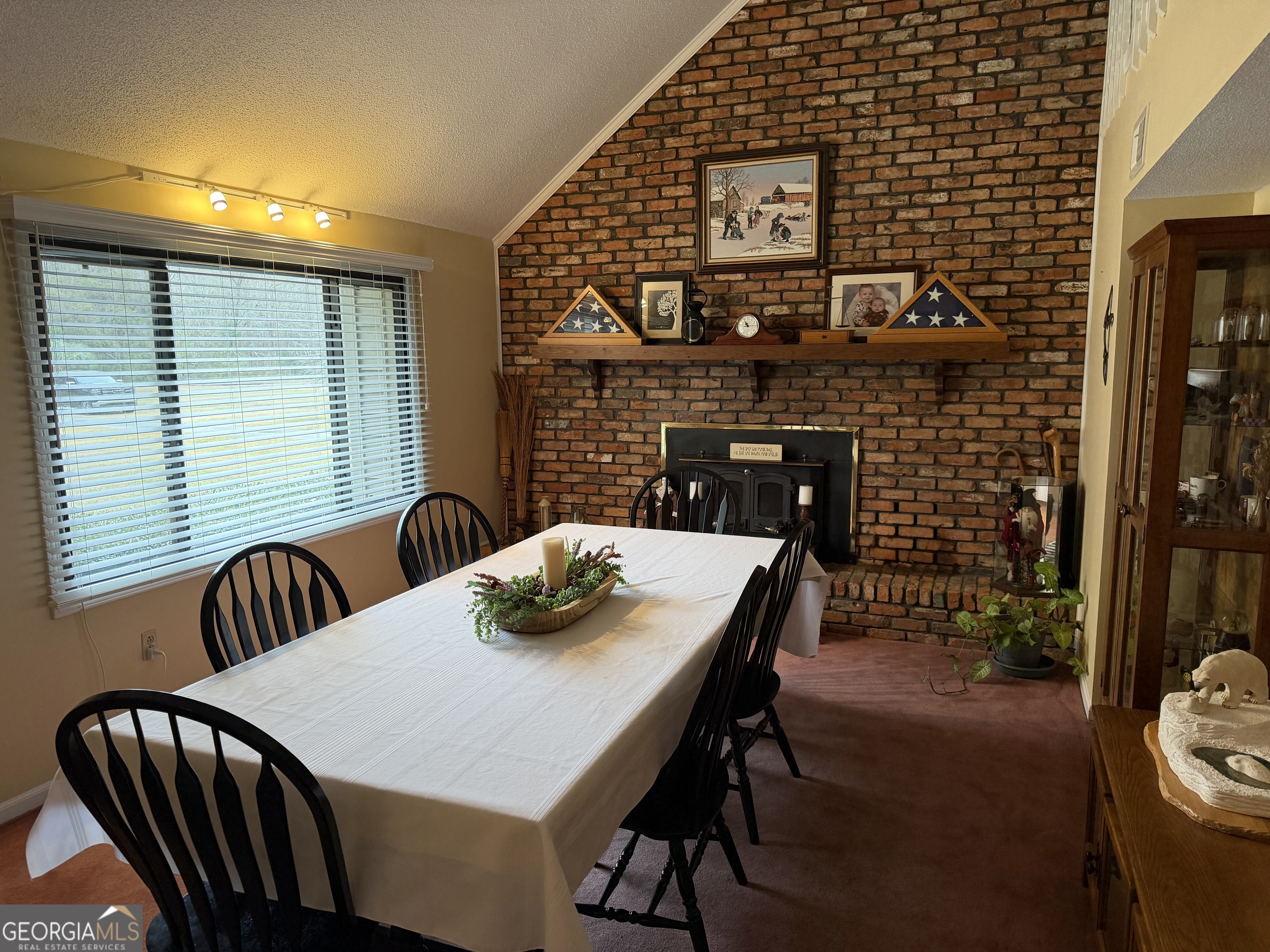 223 Trinity Road Dublin, GA 31021 - Photo 21 of 42 a view of a dining room with furniture and window