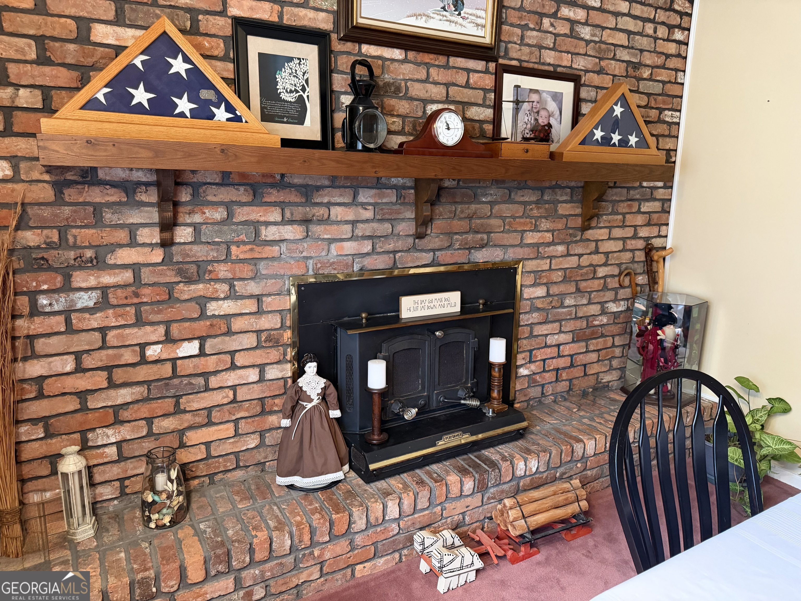 223 Trinity Road Dublin, GA 31021 - Photo 23 of 42 a living room with a fireplace