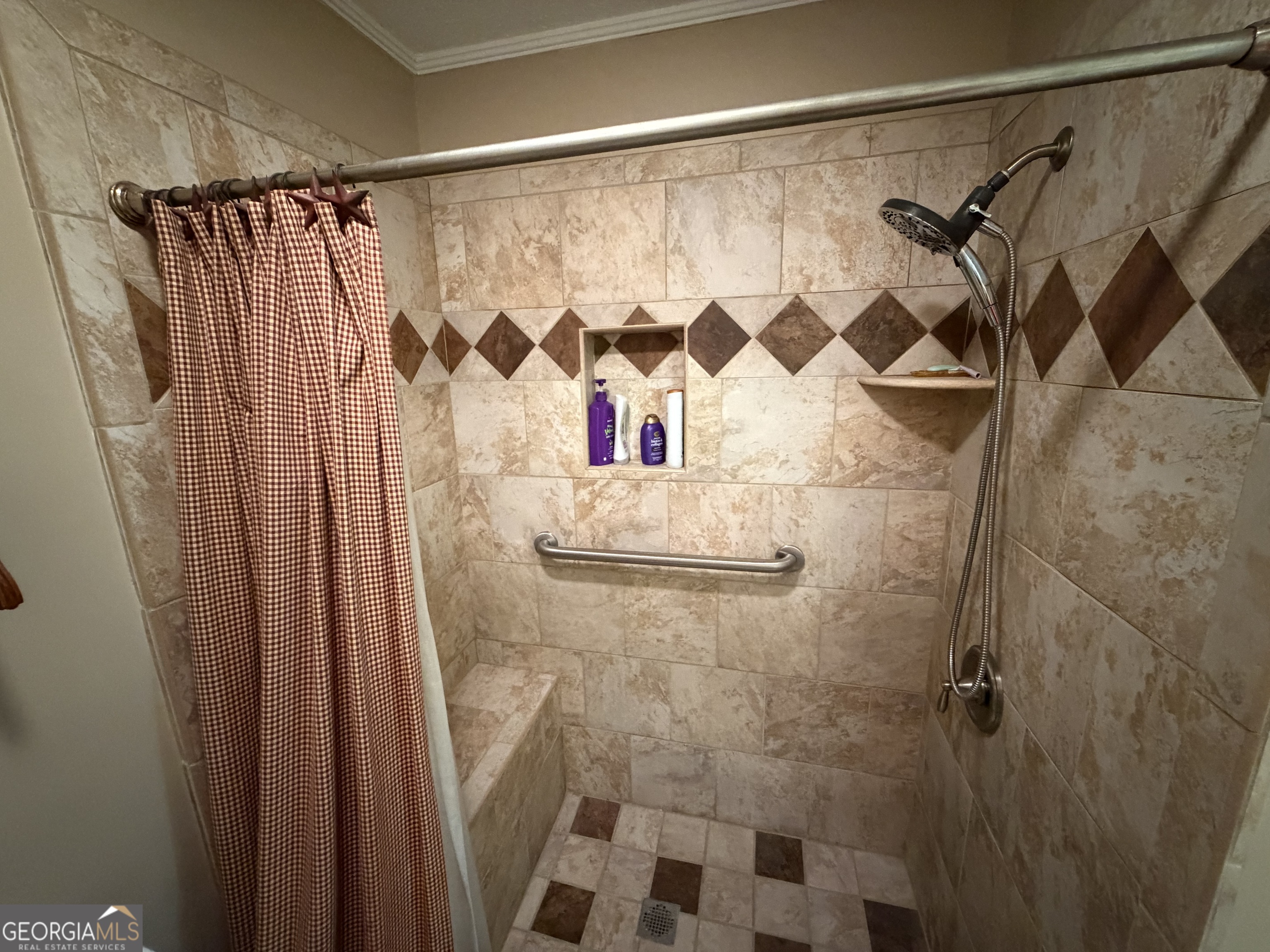 223 Trinity Road Dublin, GA 31021 - Photo 29 of 42 a bathroom with a shower and a shower curtain