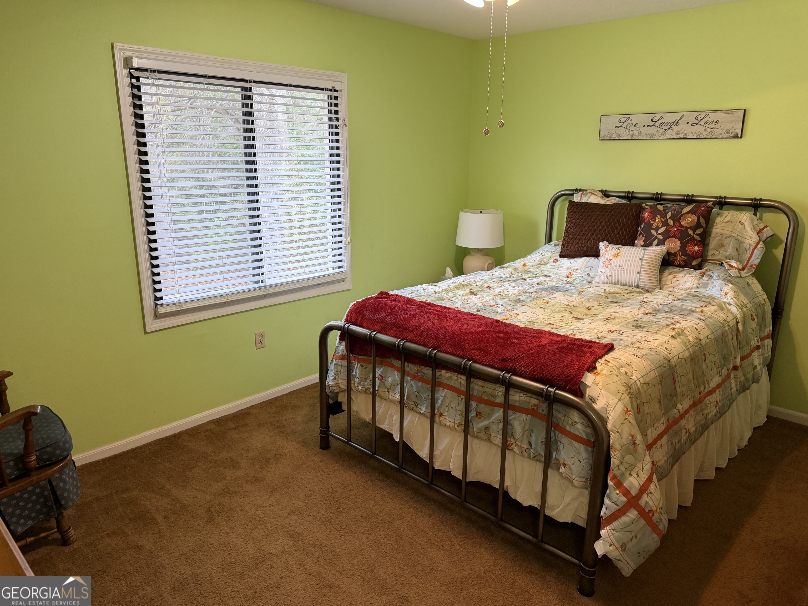 223 Trinity Road Dublin, GA 31021 - Photo 39 of 42 a bedroom with a bed and a window