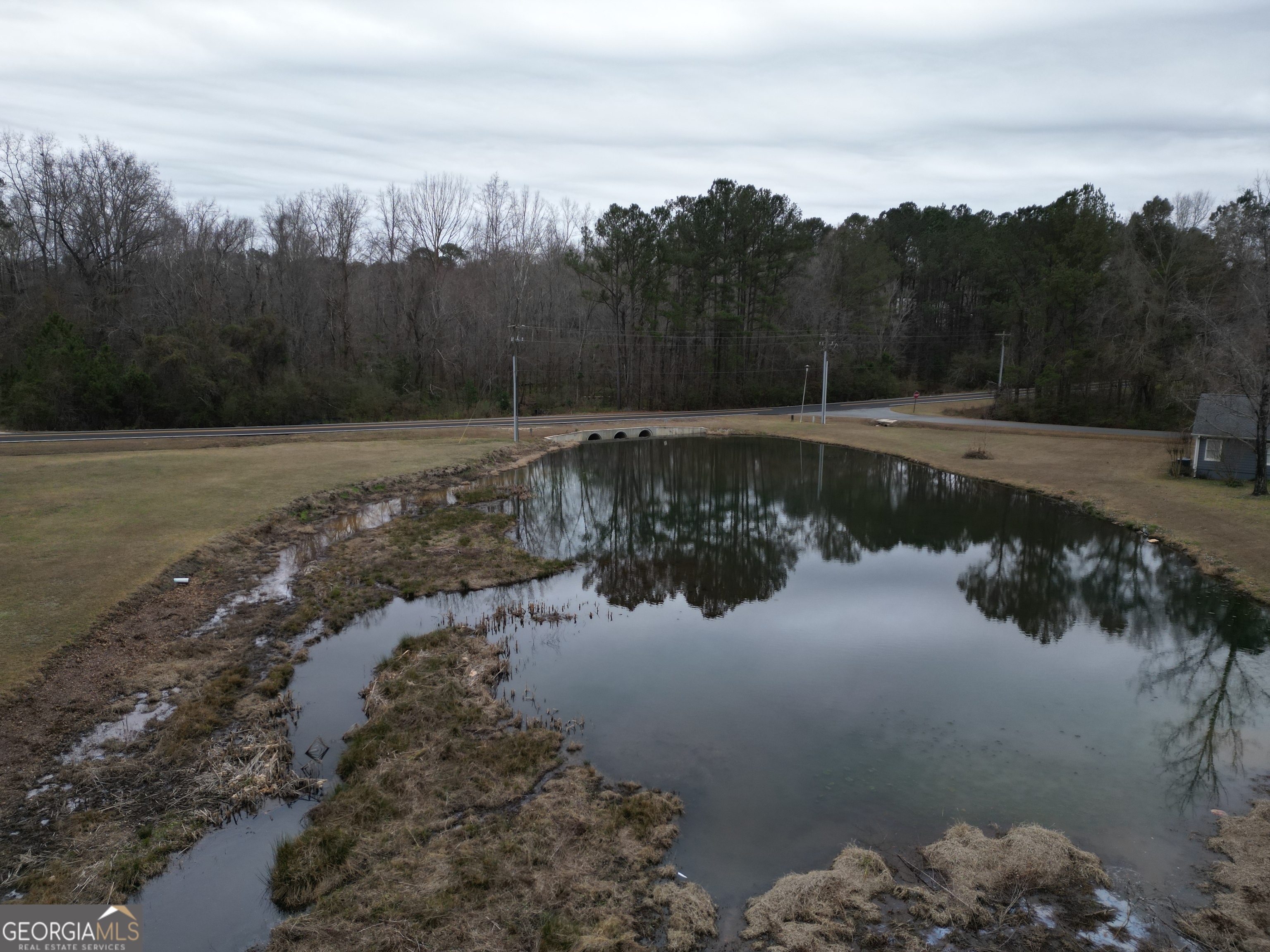 223 Trinity Road Dublin, GA 31021 - Photo 6 of 42 a view of lake with green space