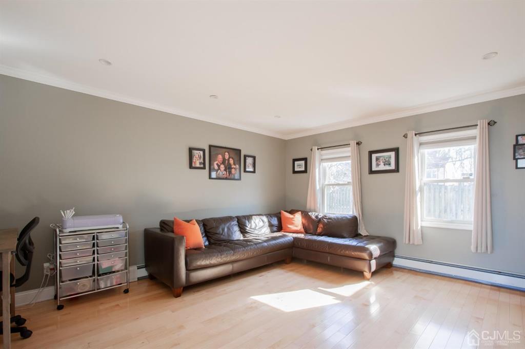 3 Stone Court Old Bridge, NJ 07747 - Photo 12 of 25 a living room with furniture and a window