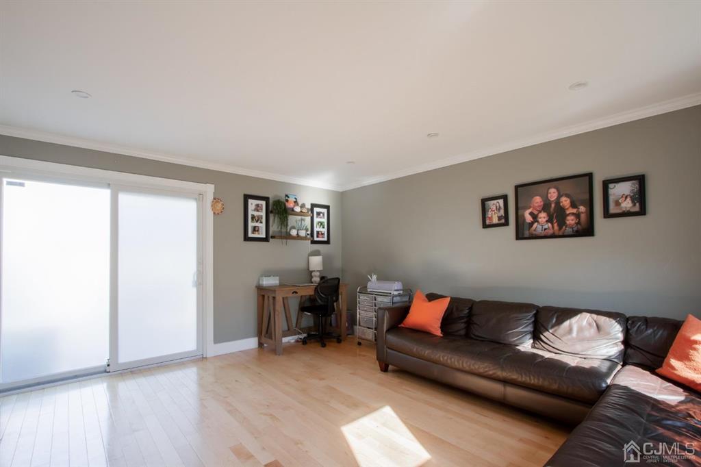 3 Stone Court Old Bridge, NJ 07747 - Photo 13 of 25 a living room with furniture and a window