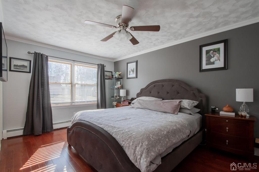3 Stone Court Old Bridge, NJ 07747 - Photo 16 of 25 a bedroom with a bed and a window