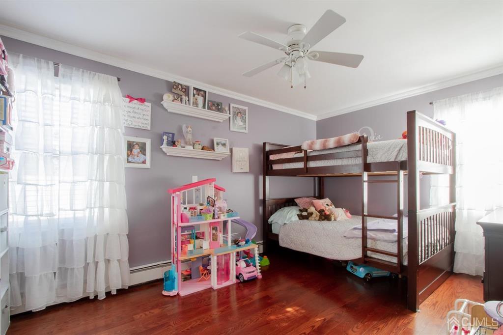 3 Stone Court Old Bridge, NJ 07747 - Photo 18 of 25 a bedroom with furniture and a window