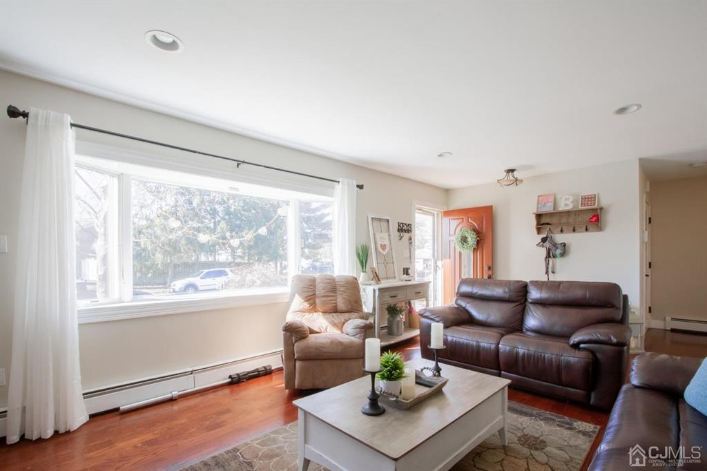 3 Stone Court Old Bridge, NJ 07747 - Photo 6 of 25 a living room with furniture and a large window