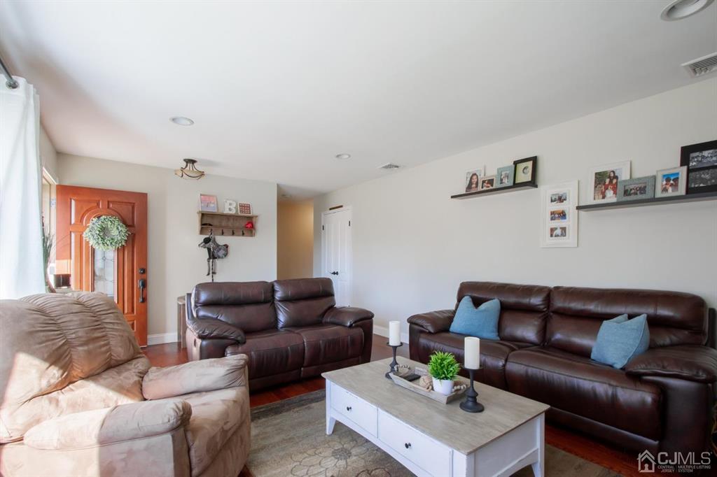 3 Stone Court Old Bridge, NJ 07747 - Photo 7 of 25 a living room with furniture and a couch