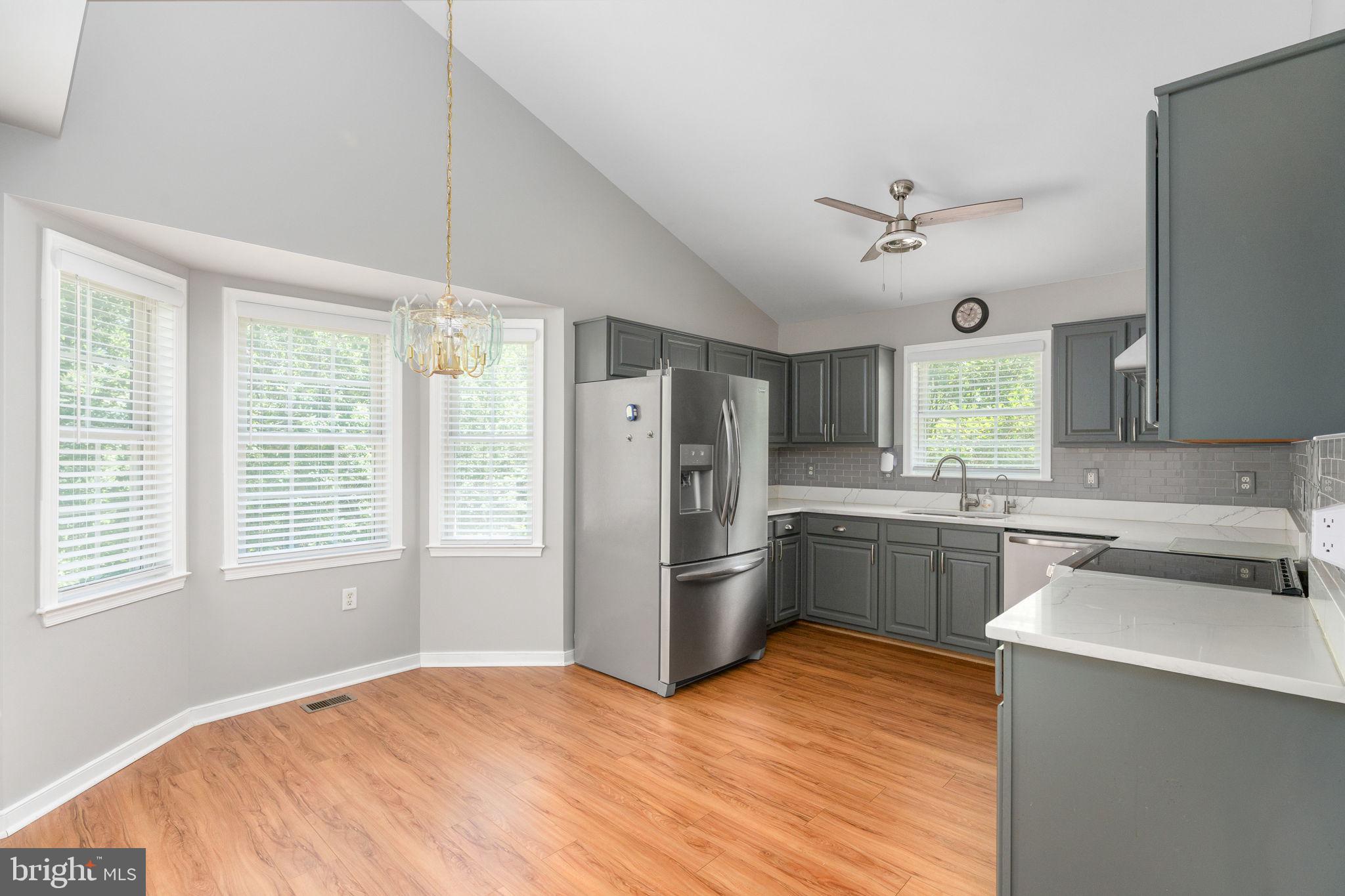 8009 Burrell Road Fredericksburg, VA 22407 - Photo 12 of 66 Bright, modern kitchen with natural light.