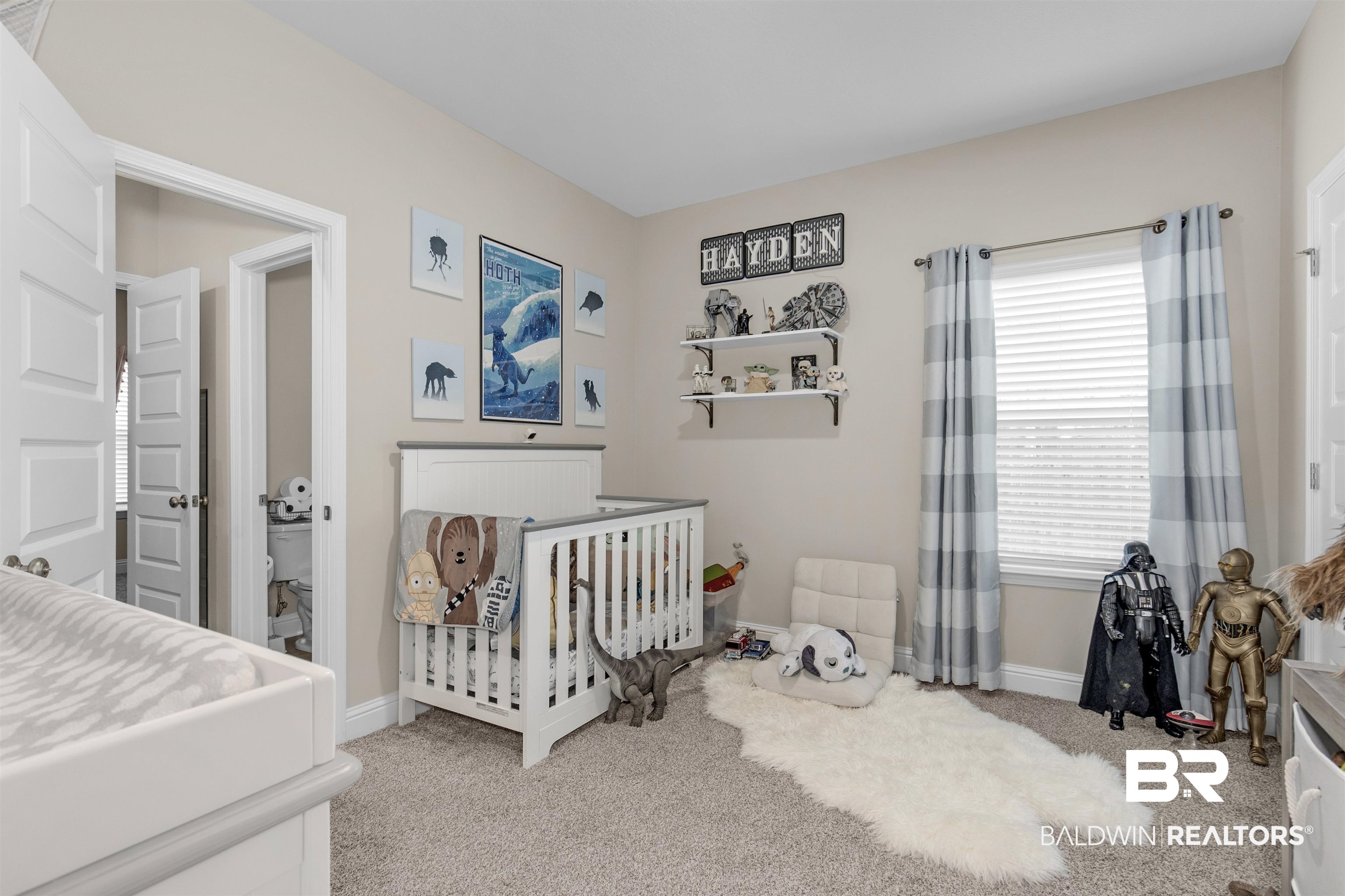 2345 Laurel Street Semmes, AL 36575 - Photo 21 of 31 Carpeted bedroom with a nursery area and baseboards