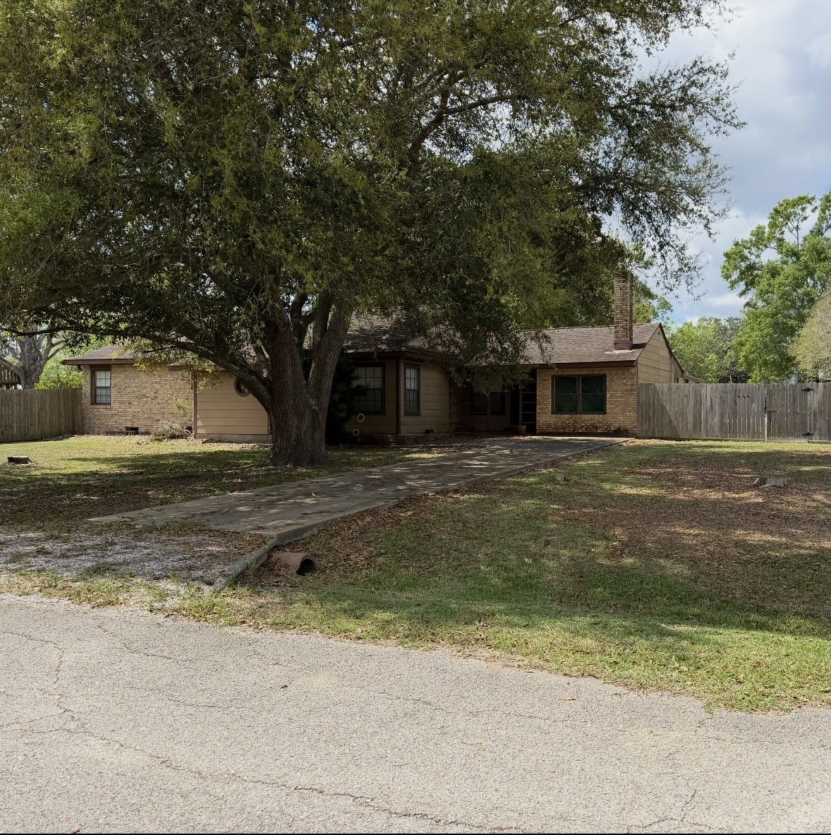 3706 College Street Damon, TX 77430 - Photo 2 of 22 a view of a house with a yard