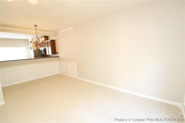 a view of a living room with a wooden floor