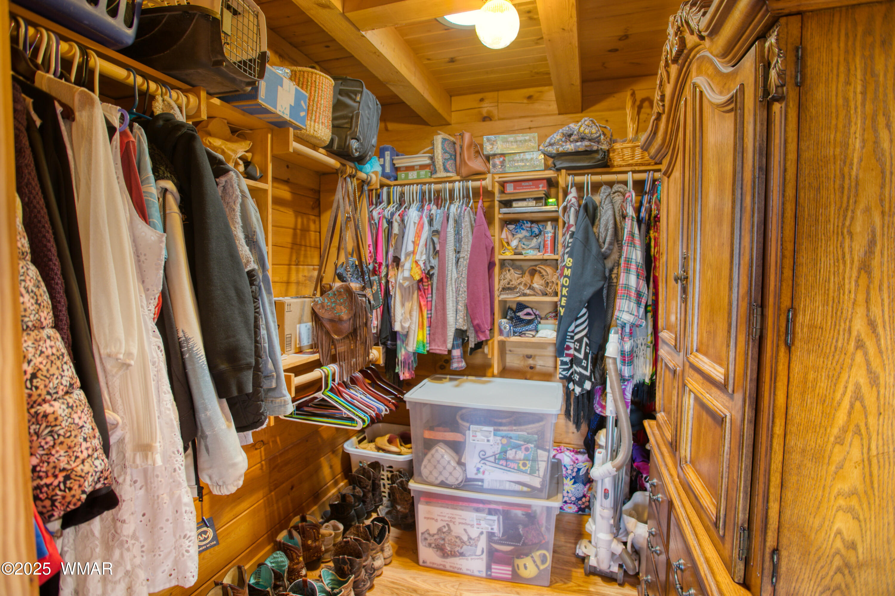 8555 Reata Lane Snowflake, AZ 85937 - Photo 30 of 88 a view of walk in closet with clothes