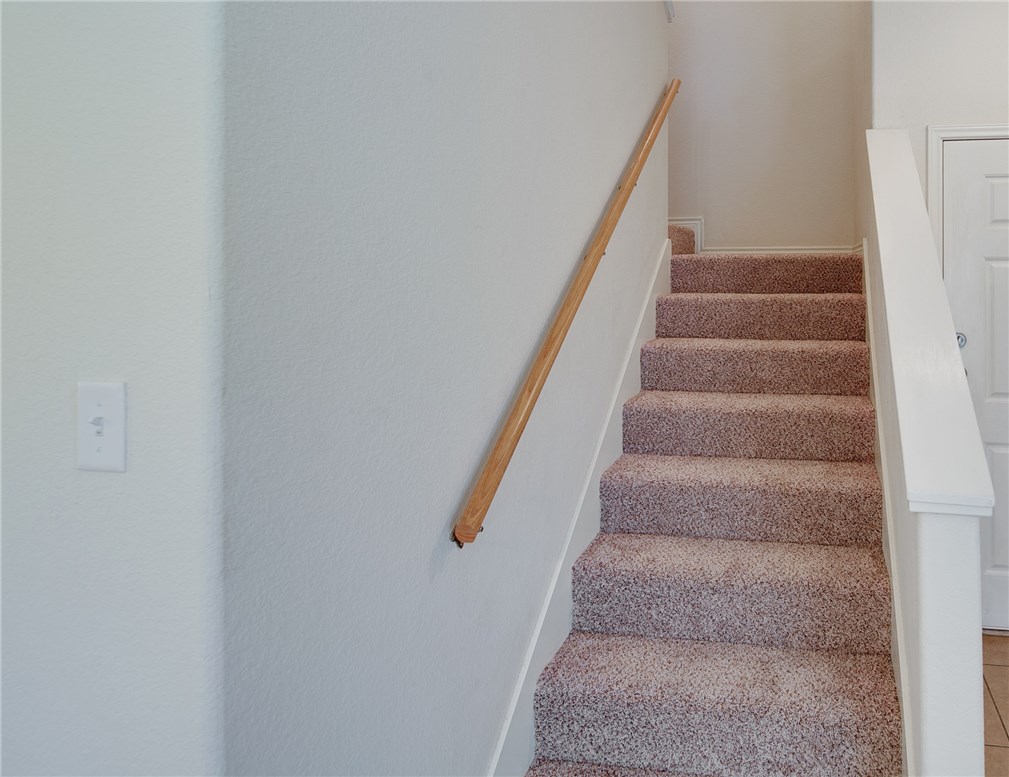 4428-4430 Reveille Road College Station, TX 77845 - Photo 15 of 22 a view of staircase with white walls
