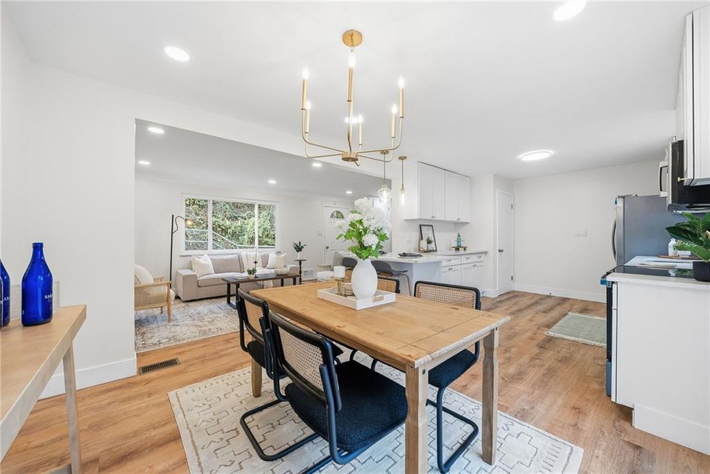 6 Tunstall Street Pittsburgh, PA 15207 - Photo 12 of 49 a view of a dining room with furniture