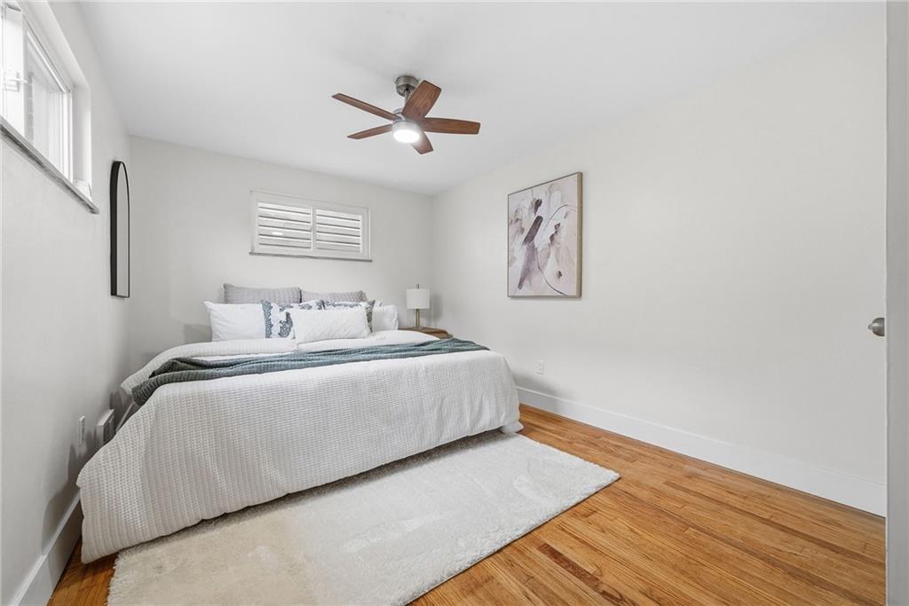 6 Tunstall Street Pittsburgh, PA 15207 - Photo 19 of 49 a bedroom with a bed and painting on the wall