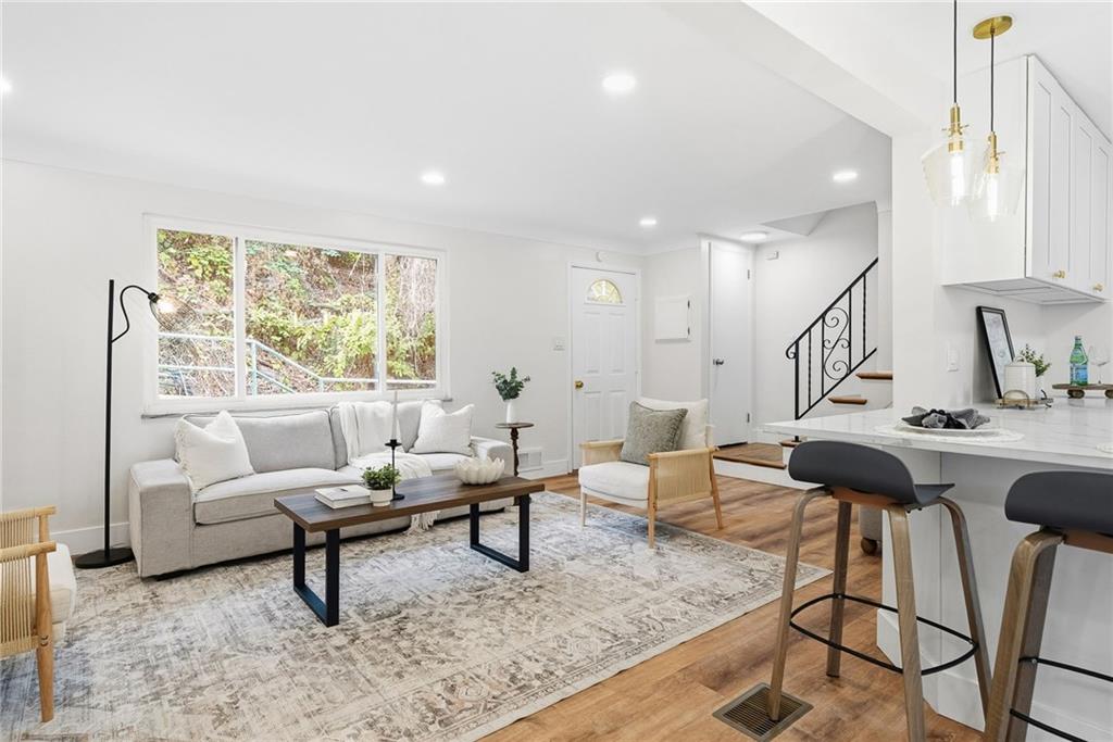 6 Tunstall Street Pittsburgh, PA 15207 - Photo 6 of 49 a living room with furniture and wooden floor
