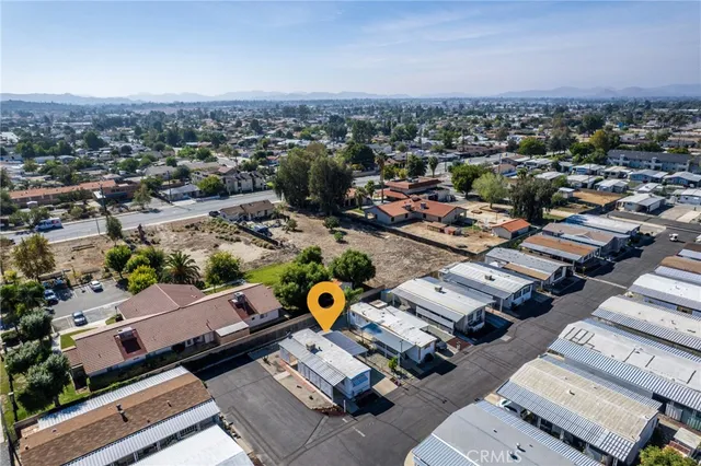 an aerial view of a city with lots of residential buildings