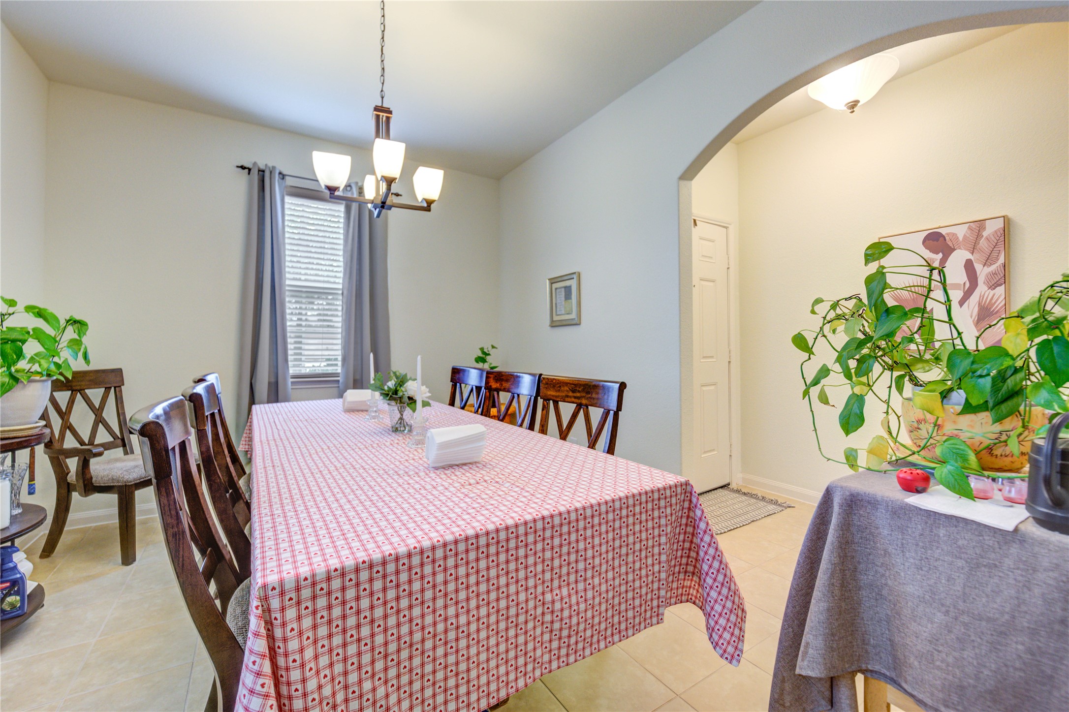 9443 Sky Blue Drive Rosharon, TX 77583 - Photo 6 of 23 Spacious dining room features a cozy atmosphere and natural light.
