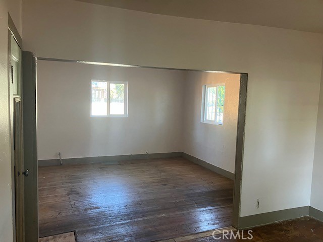 2294 Mulberry Street Chico, CA 95928 - Photo 14 of 16 an empty room with wooden floor and windows
