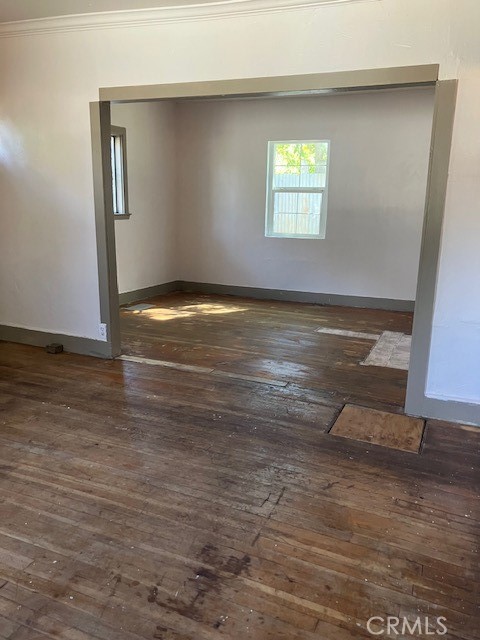 2294 Mulberry Street Chico, CA 95928 - Photo 6 of 16 an empty room with wooden floor and windows