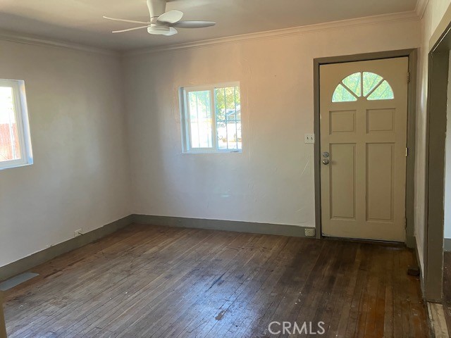 2294 Mulberry Street Chico, CA 95928 - Photo 7 of 16 an empty room with wooden floor and windows