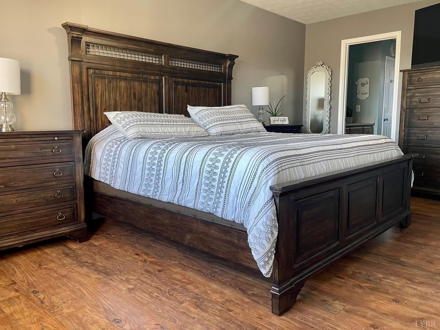 7207 Stage Road Concord, VA 24538 - Photo 14 of 29 a bedroom with a bed and a dresser