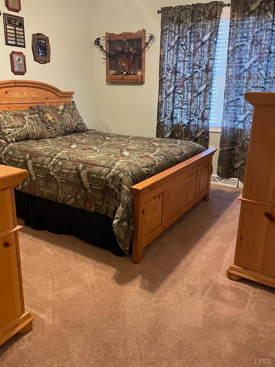 7207 Stage Road Concord, VA 24538 - Photo 23 of 29 a bedroom with bed and furniture