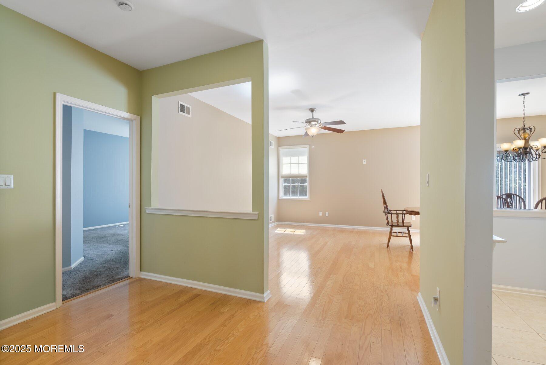 24 Little Leaf Lane Howell, NJ 07731 - Photo 12 of 32 a view of a room with wooden floor