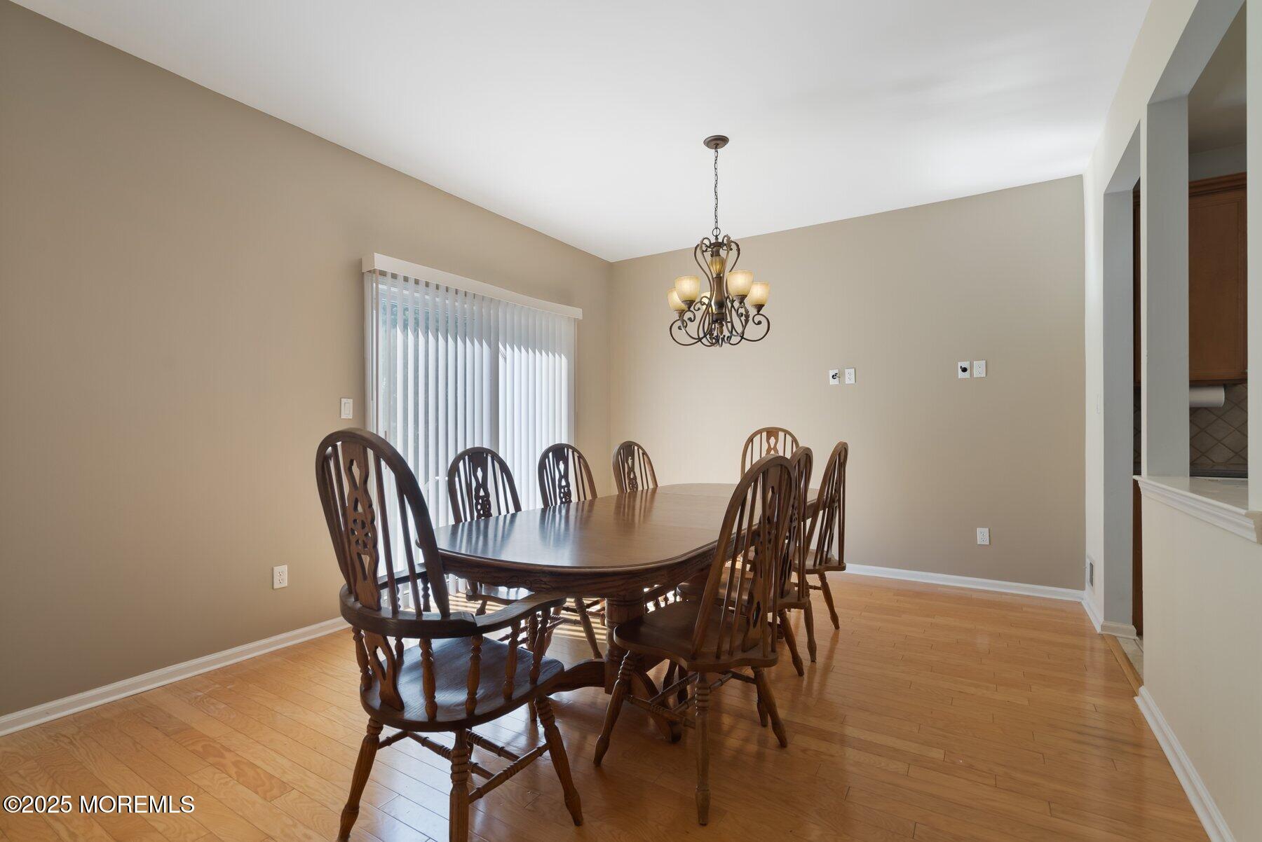 24 Little Leaf Lane Howell, NJ 07731 - Photo 14 of 32 a view of a dining room with furniture window and wooden floor