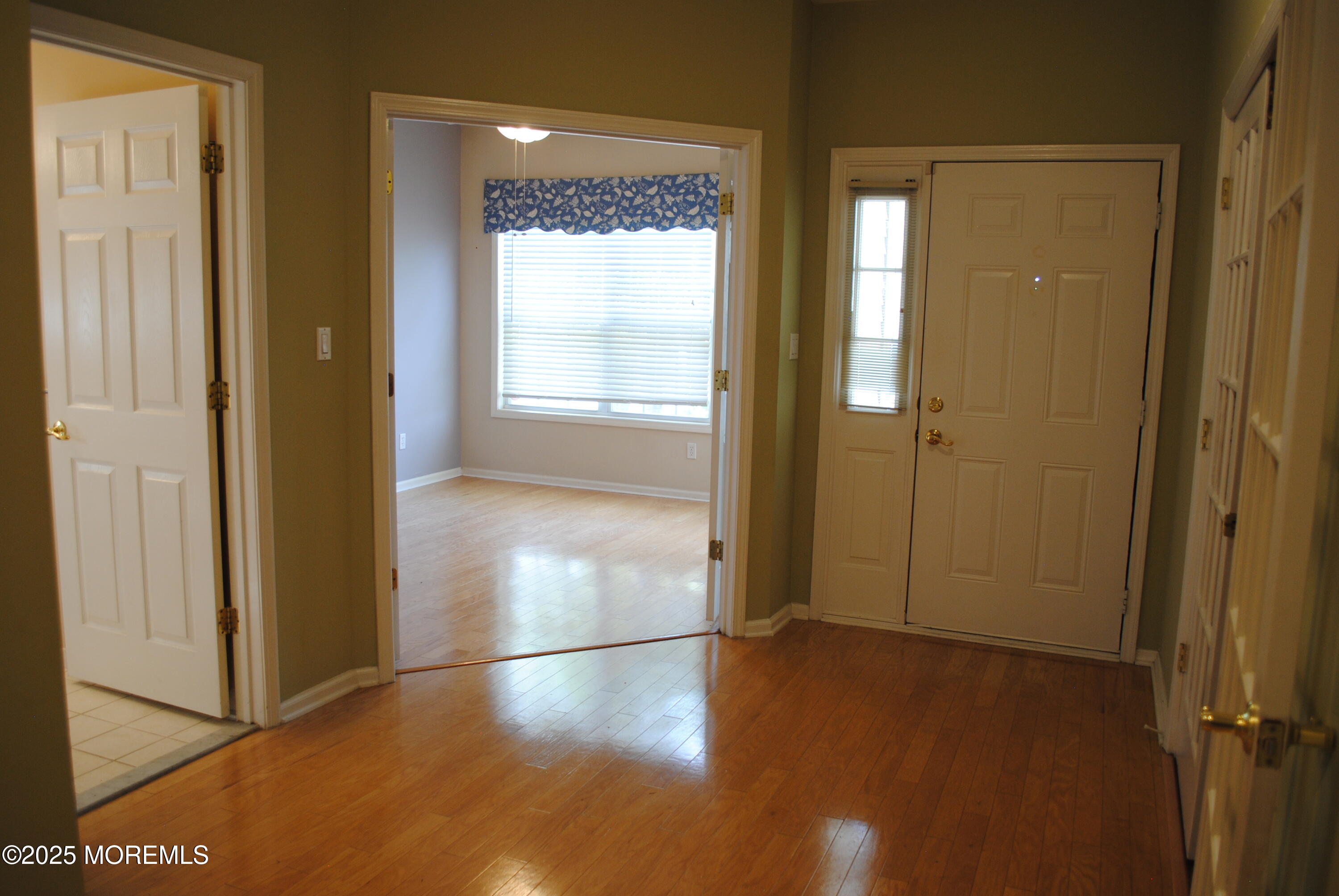 24 Little Leaf Lane Howell, NJ 07731 - Photo 8 of 32 a view of a hallway with wooden floor