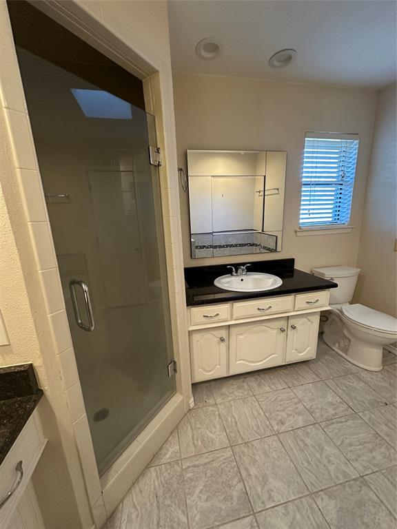 3713 Andrea Lane Rowlett, TX 75088 - Photo 11 of 18 a kitchen with a refrigerator and a stove