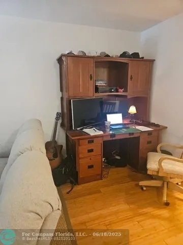 a kitchen with a sink cabinets and appliances
