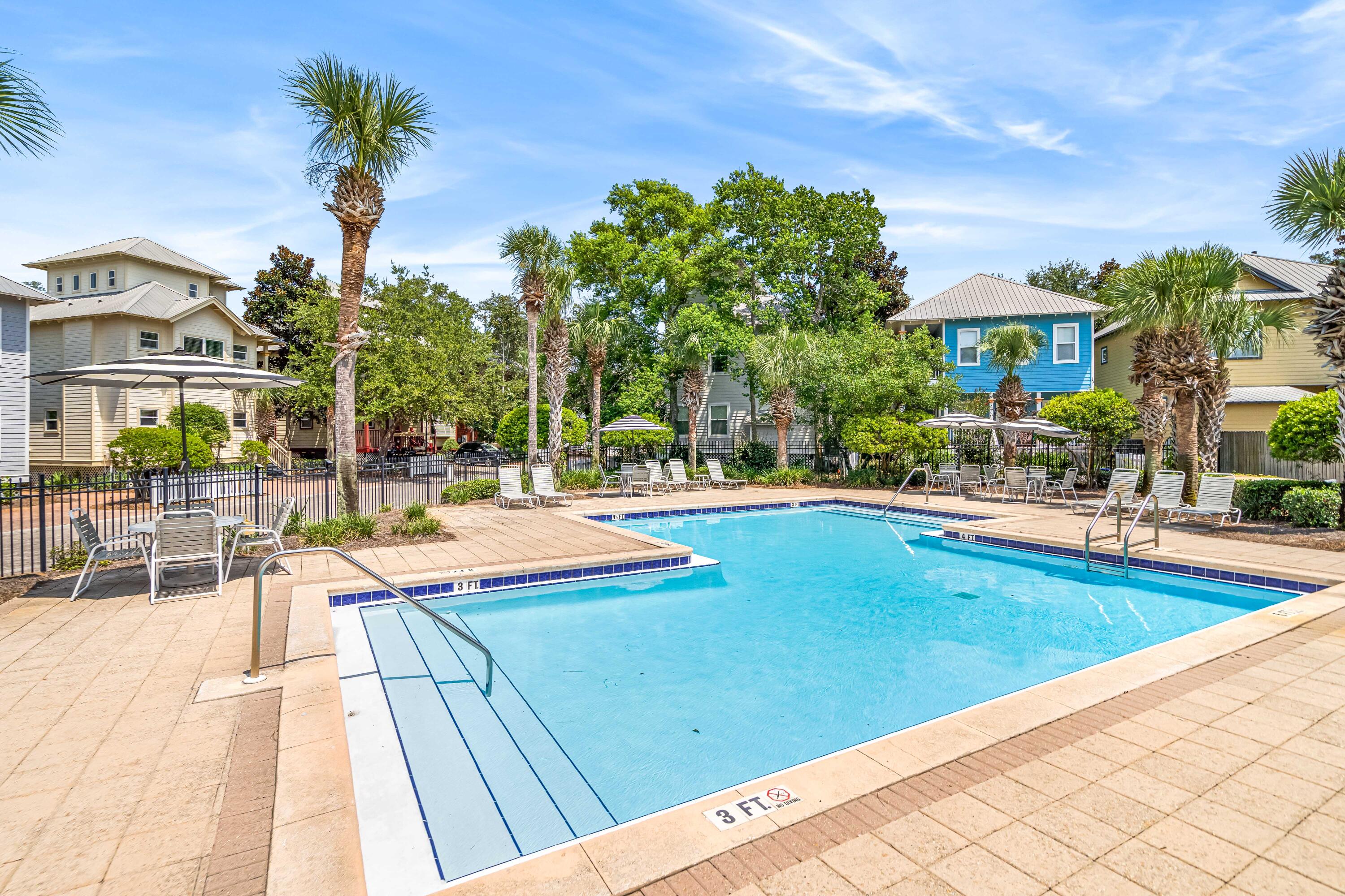 120 Hidden Lake Way Santa Rosa Beach, FL 32459 - Photo 39 of 56 a view of swimming pool with outdoor seating and a garden