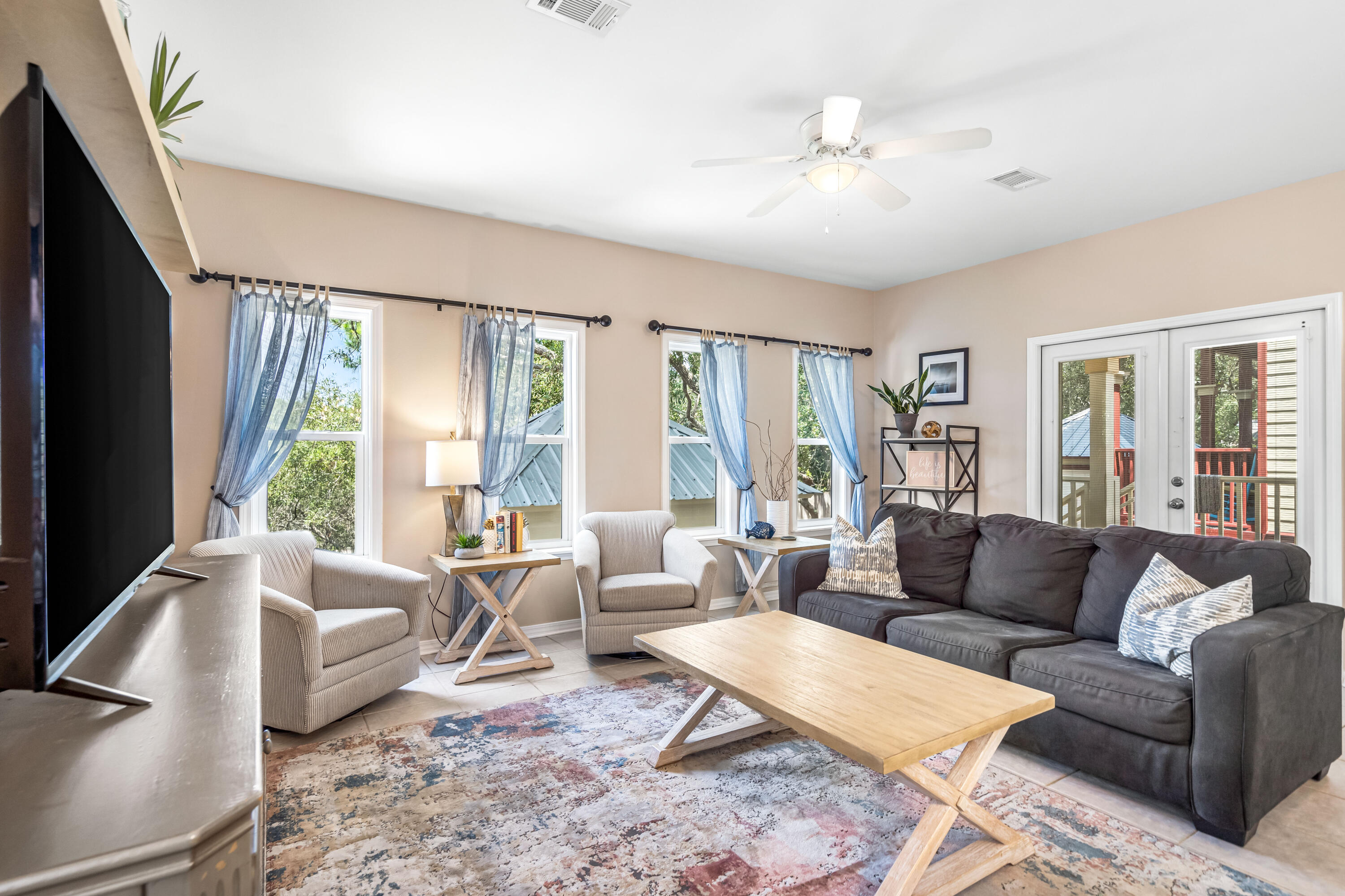 120 Hidden Lake Way Santa Rosa Beach, FL 32459 - Photo 6 of 56 a living room with furniture and a large window