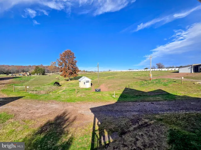 a kitchen with stainless steel appliances granite countertop a stove and a refrigerator