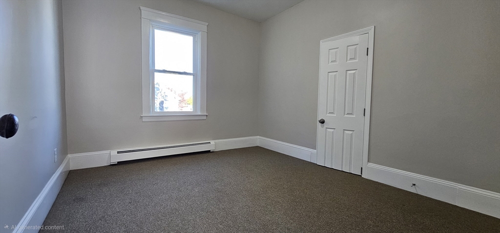 20 Park Avenue, Unit 1 Webster, MA 01570 - Photo 12 of 20 an empty room with a window